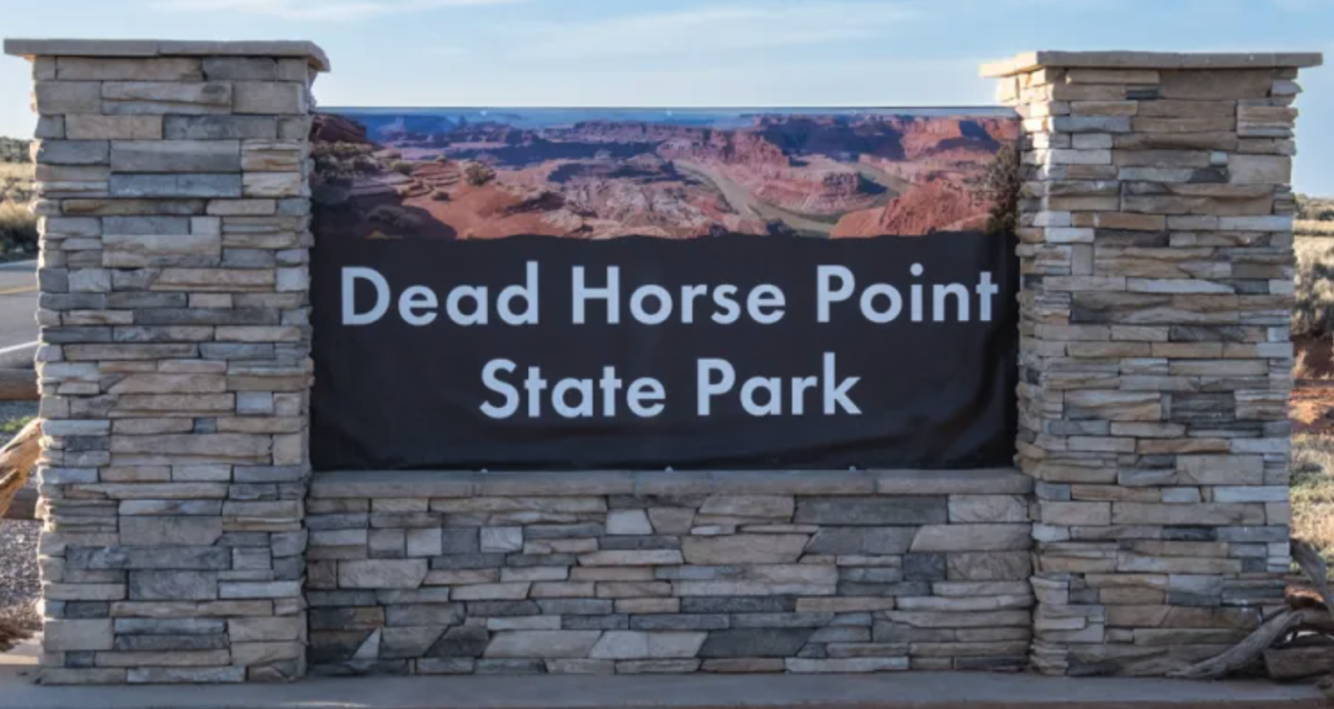 Dead Horse Point State Park Entrance Sign Stone entrance sign for Dead Horse Point State Park with a canyon photo above the name